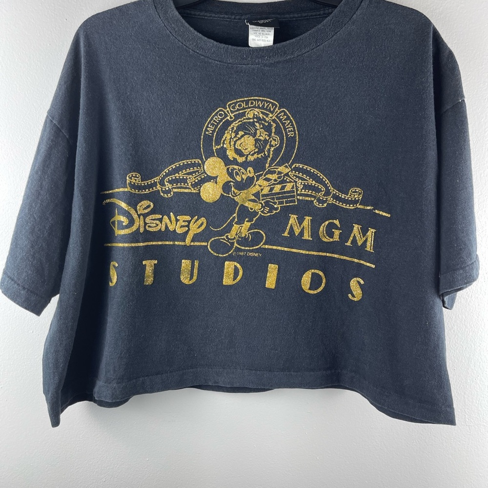 Vintage MGM Studeos one size fits all t-shirt with gold colored graphic